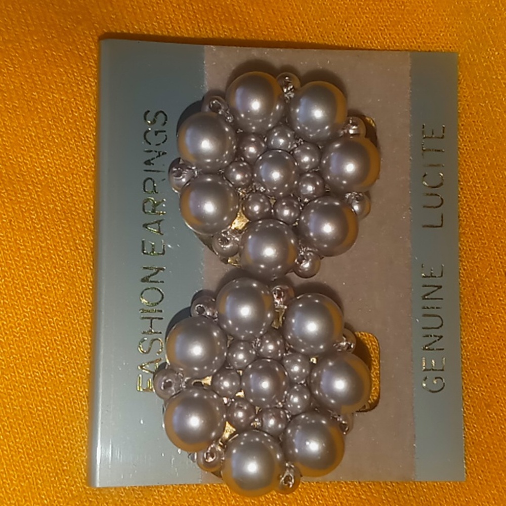 Lucite fashion earrings.